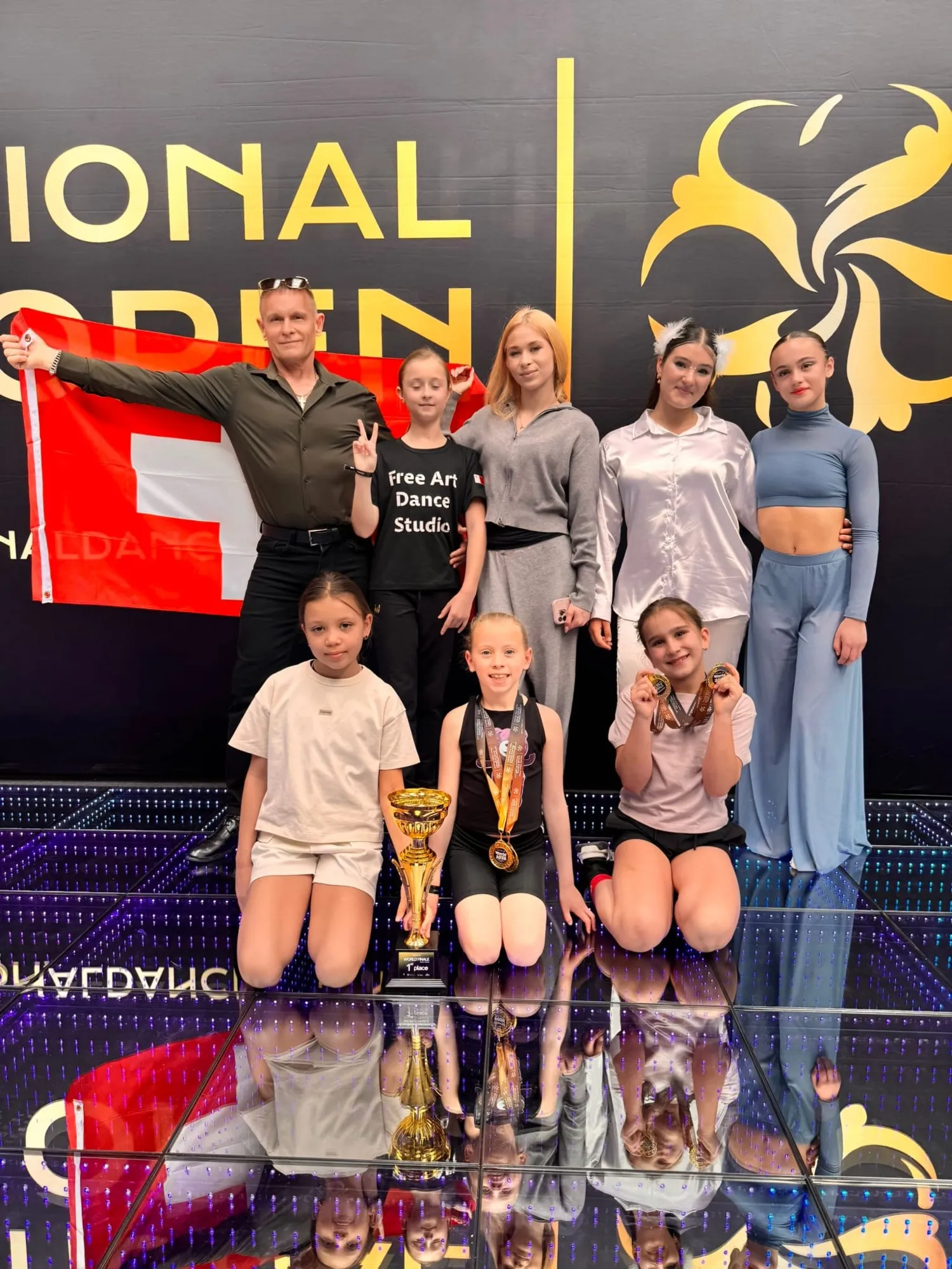 Athletes celebrating on stage