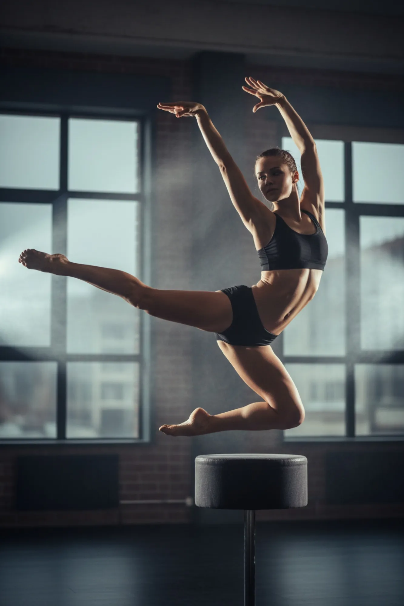 Dancer mid-jump in the studio